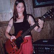 Angela playing guitar