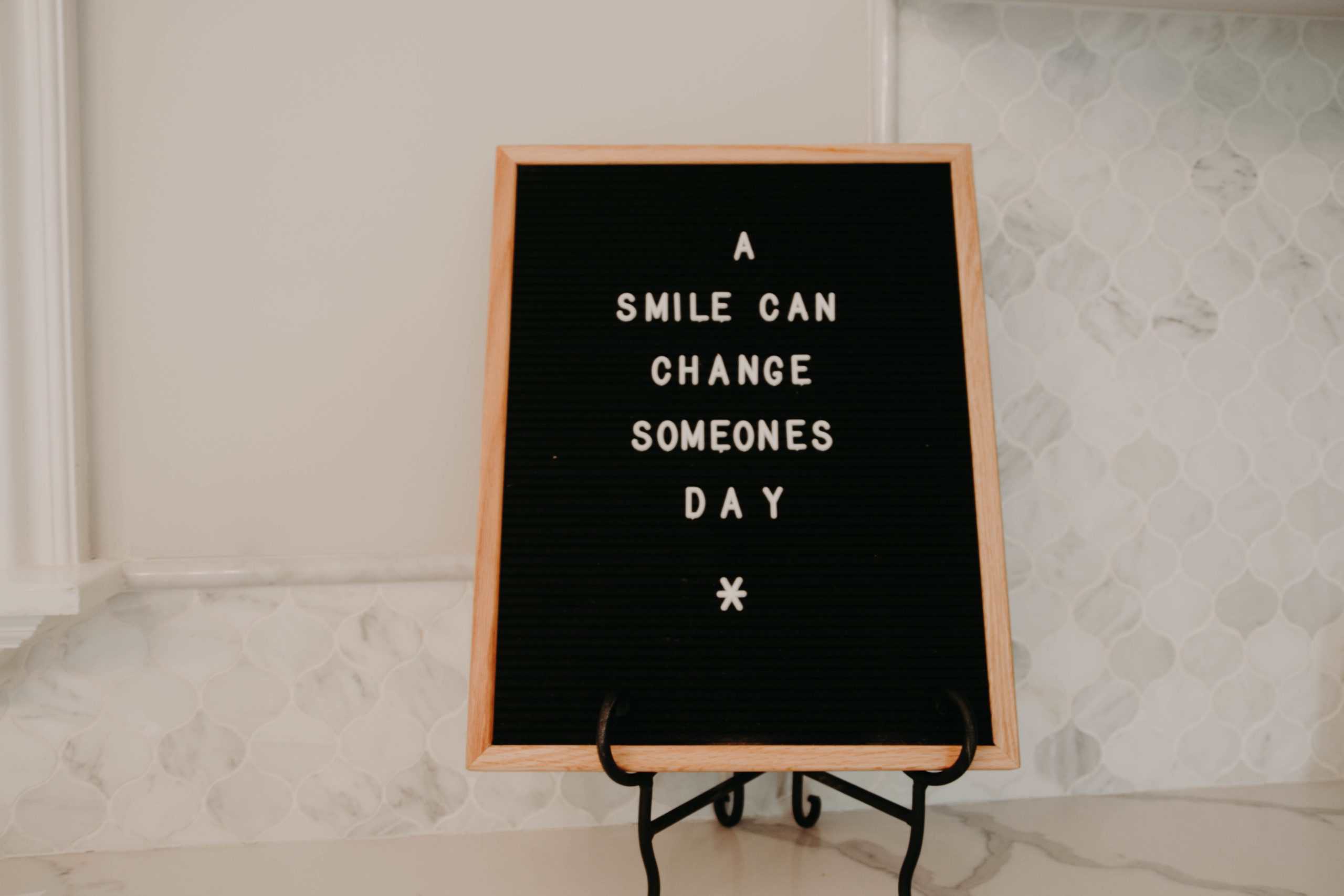 Quote: A smile can change someones day | NOW Marketing Group: How to Create a Culture of Happiness