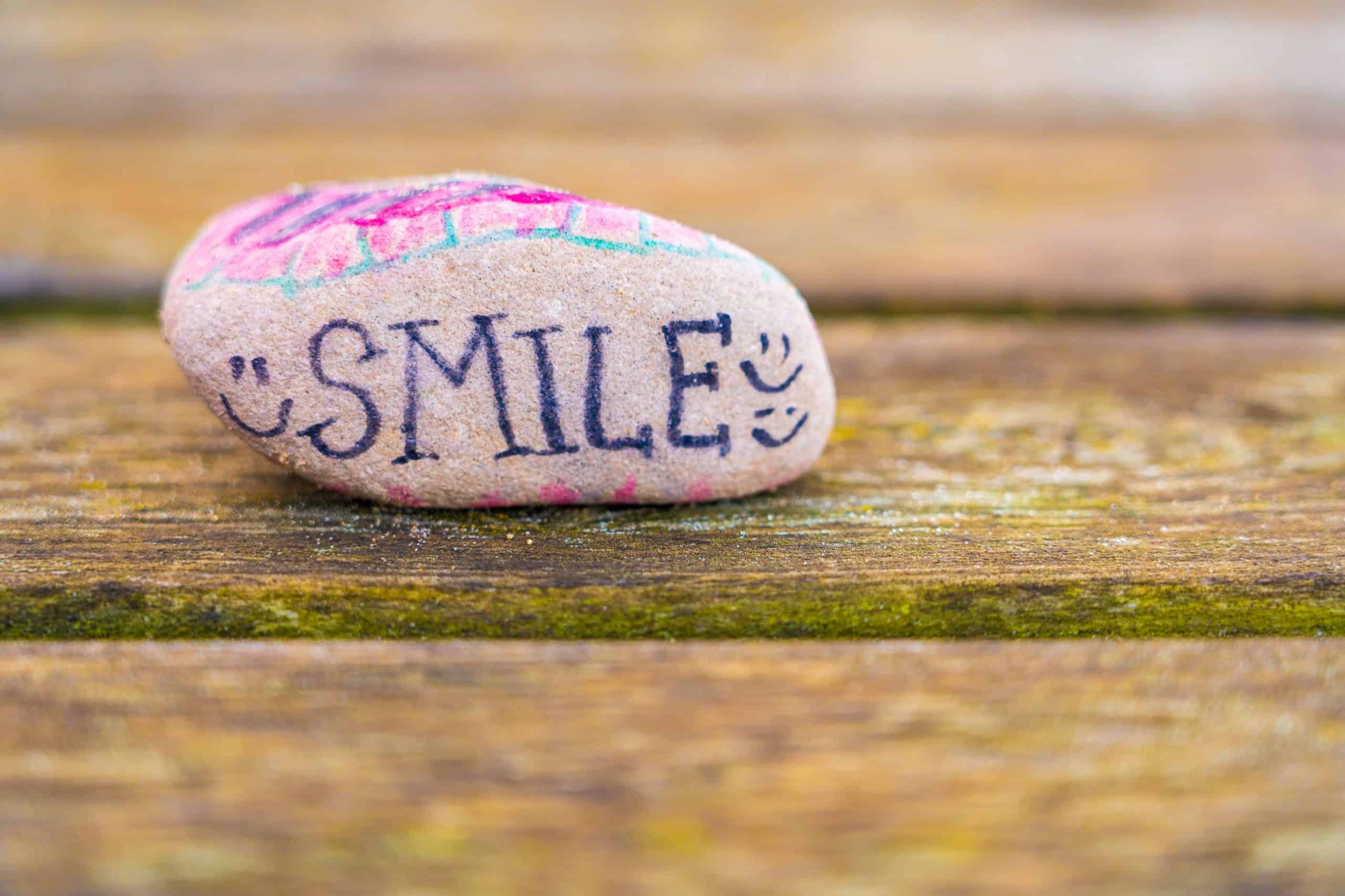 Smile | Image in blog: How to Create a Culture Based on Happiness