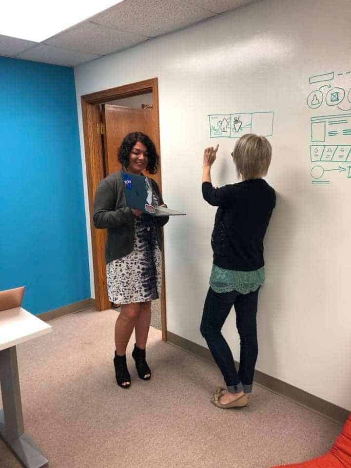 Jessika and team member brainstorming ideas